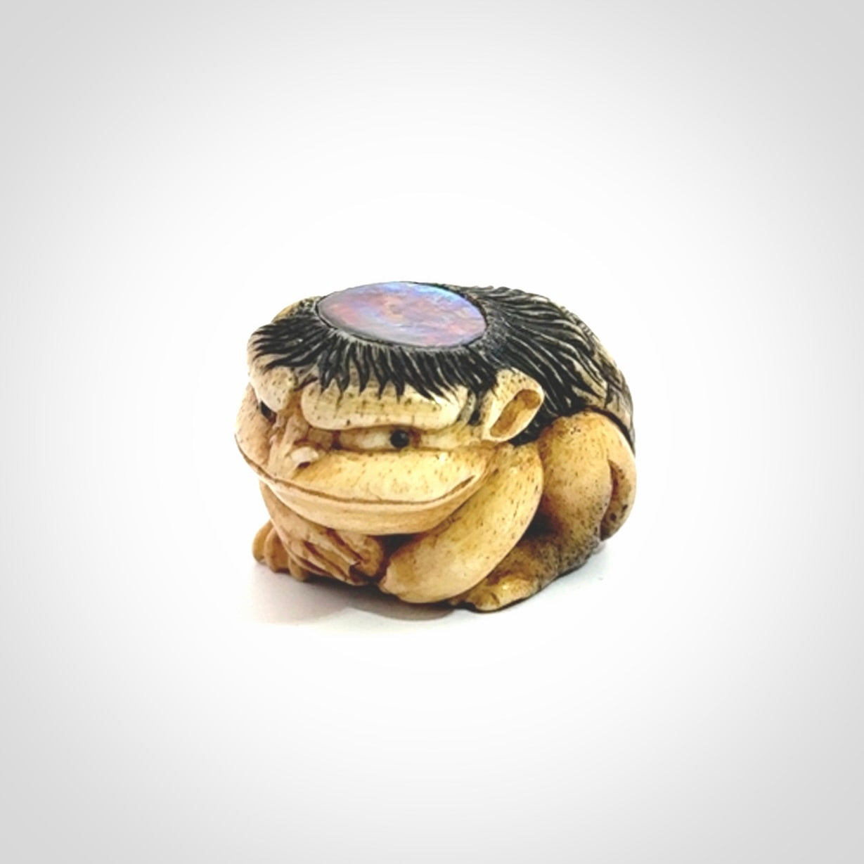 Hand carved incredible Kappa holding cucumber carving in deer antler with paua shell and buffalo horn. A one off collectors item that has been hand crafted to be displayed.