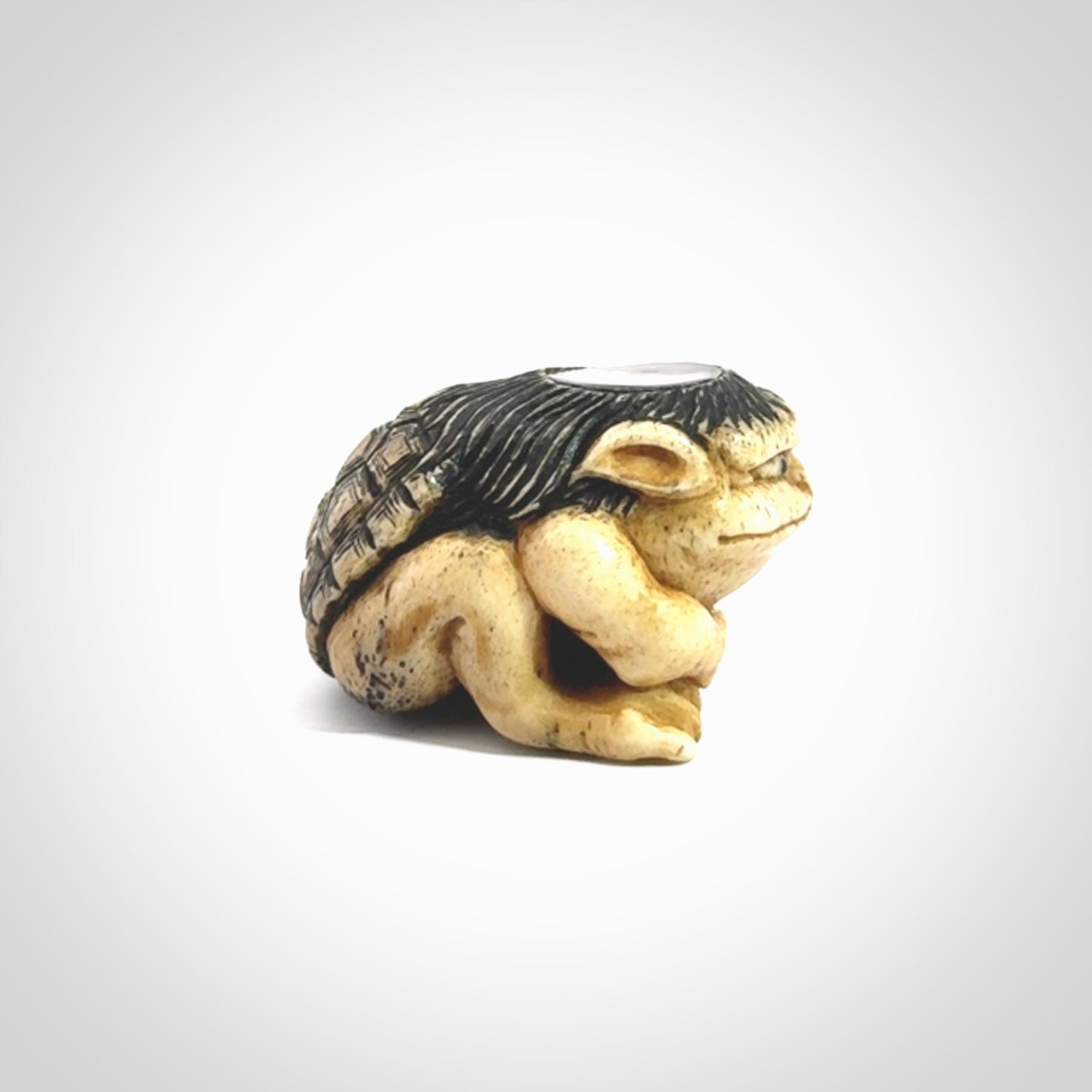 Hand carved incredible Kappa holding cucumber carving in deer antler with paua shell and buffalo horn. A one off collectors item that has been hand crafted to be displayed.