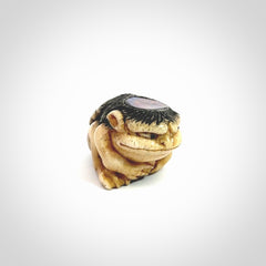 Hand carved incredible Kappa holding cucumber carving in deer antler with paua shell and buffalo horn. A one off collectors item that has been hand crafted to be displayed.