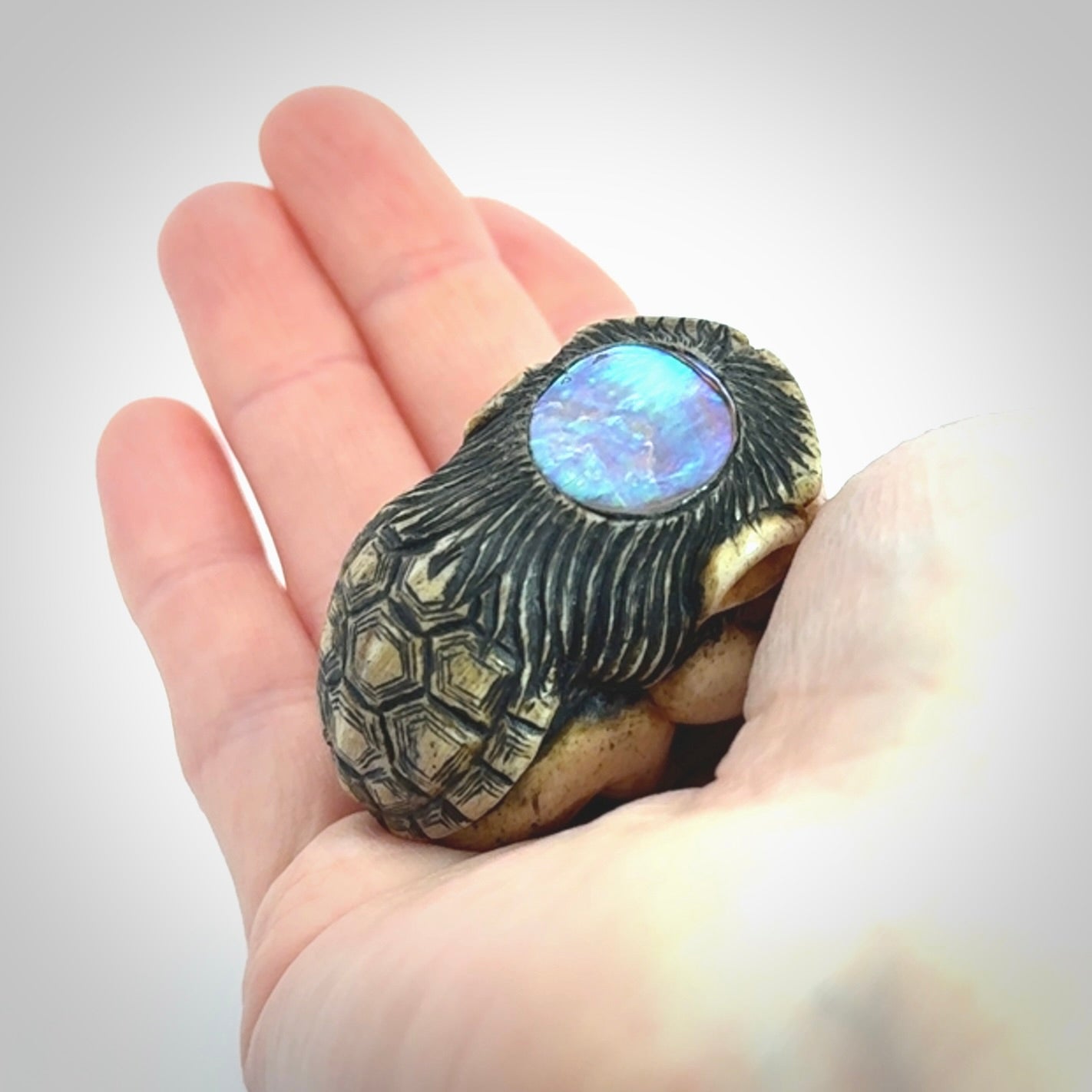 Hand carved incredible Kappa holding cucumber carving in deer antler with paua shell and buffalo horn. A one off collectors item that has been hand crafted to be displayed.