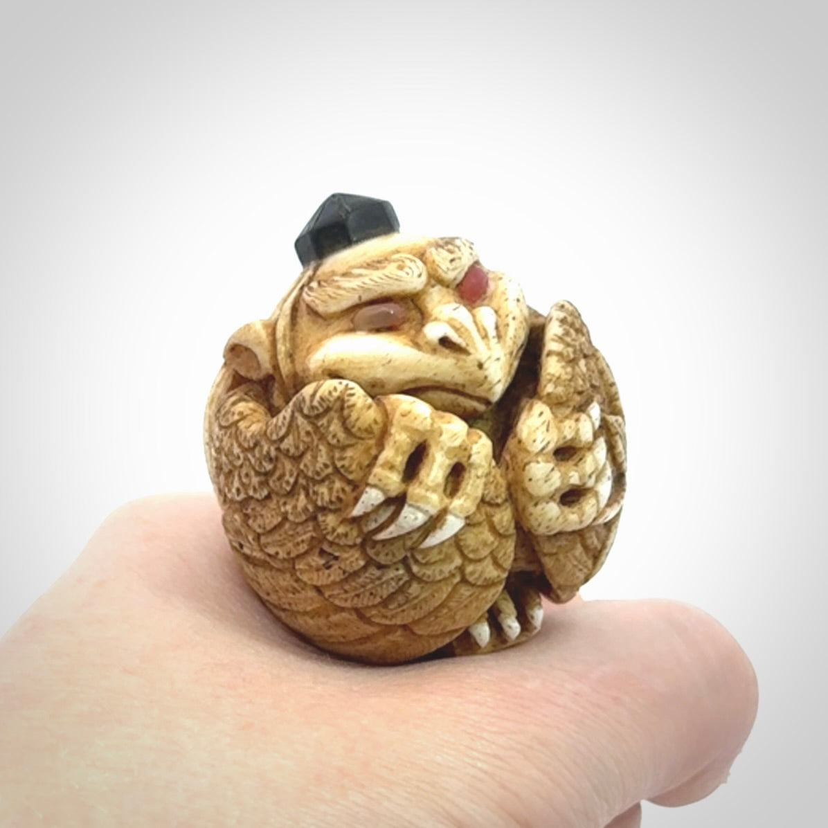 Hand carved Karasu Tengu carving made from Deer antler with Buffalo Horn. Hand made by master bone carver Fumio Noguchi. Spectacular collectable work of art to display. One only, delivered to you at no extra cost with express courier.