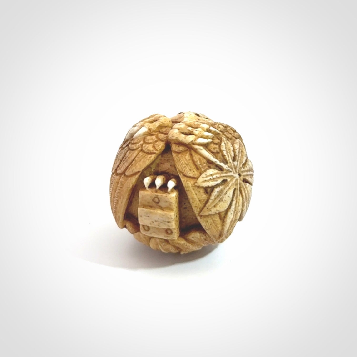 Hand carved Karasu Tengu carving made from Deer antler with Buffalo Horn. Hand made by master bone carver Fumio Noguchi. Spectacular collectable work of art to display. One only, delivered to you at no extra cost with express courier.