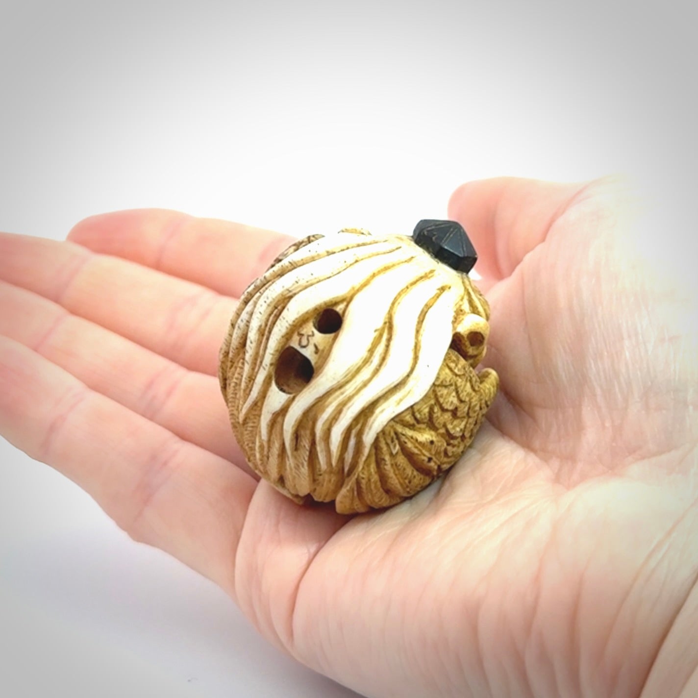 Hand carved Karasu Tengu carving made from Deer antler with Buffalo Horn. Hand made by master bone carver Fumio Noguchi. Spectacular collectable work of art to display. One only, delivered to you at no extra cost with express courier.