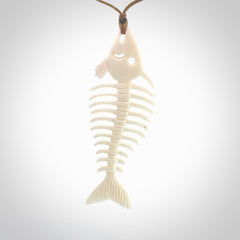 Hand carved bone fish skeleton pendant. Hand made bone fish necklace. Fish themed jewellery. Ocean themed pendant. One only necklace provided with adjustable cord and free delivery.