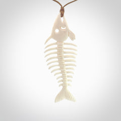 Hand carved bone fish skeleton pendant. Hand made bone fish necklace. Fish themed jewellery. Ocean themed pendant. One only necklace provided with adjustable cord and free delivery.