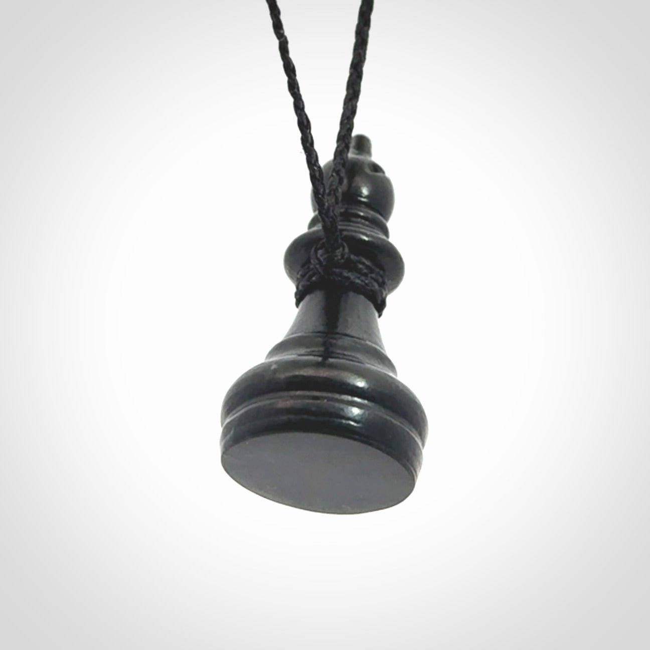 Hand carved jade chess pendants. Hand made chess piece necklaces, carved from British Columbian Jade.