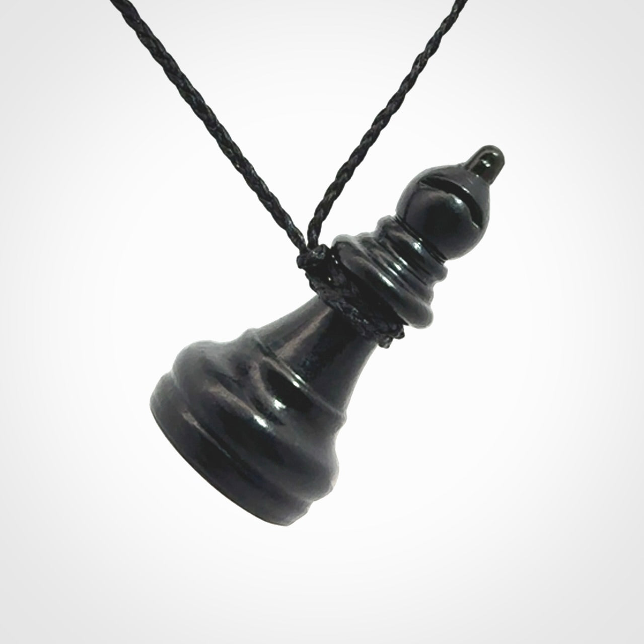 Hand carved jade chess pendants. Hand made chess piece necklaces, carved from British Columbian Jade.