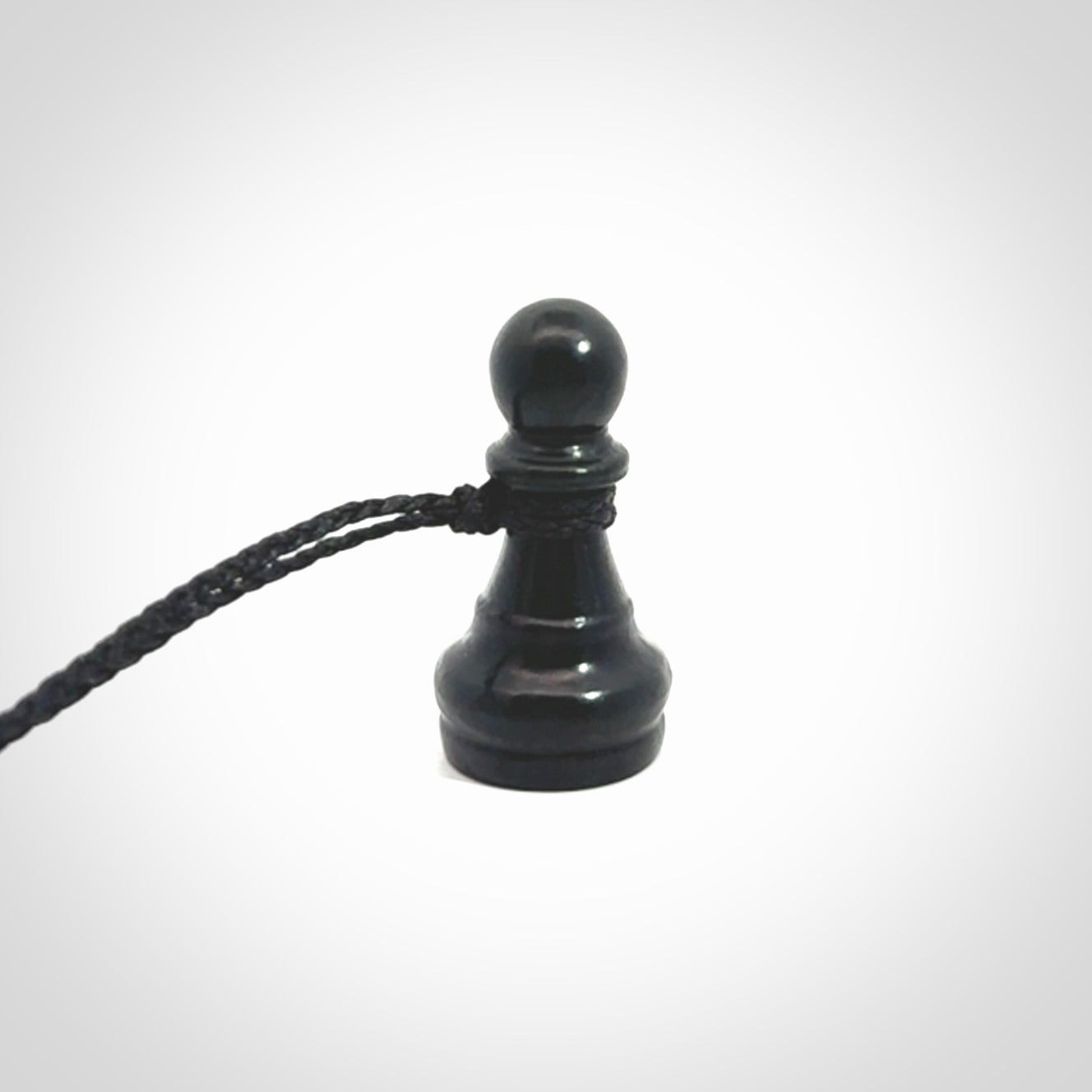 Hand carved jade chess pendants. Hand made chess piece necklaces, carved from British Columbian Jade.