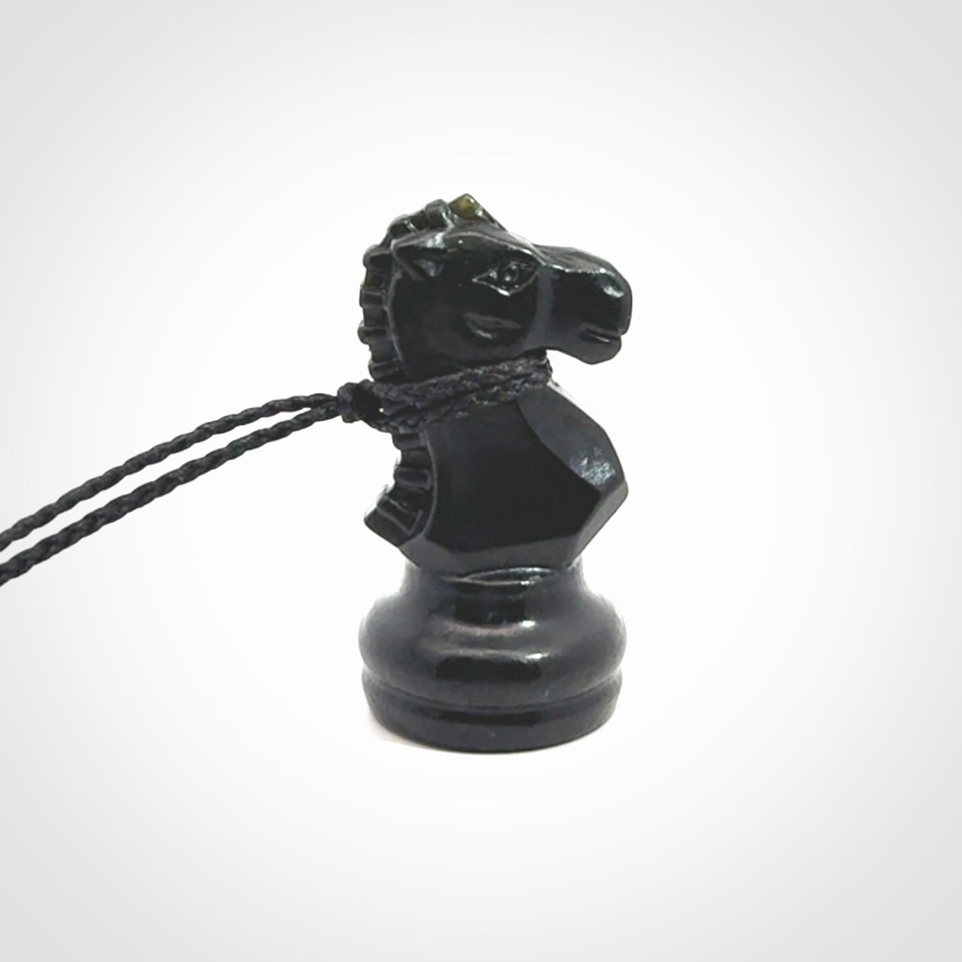 Hand carved jade chess pendants. Hand made chess piece necklaces, carved from British Columbian Jade.