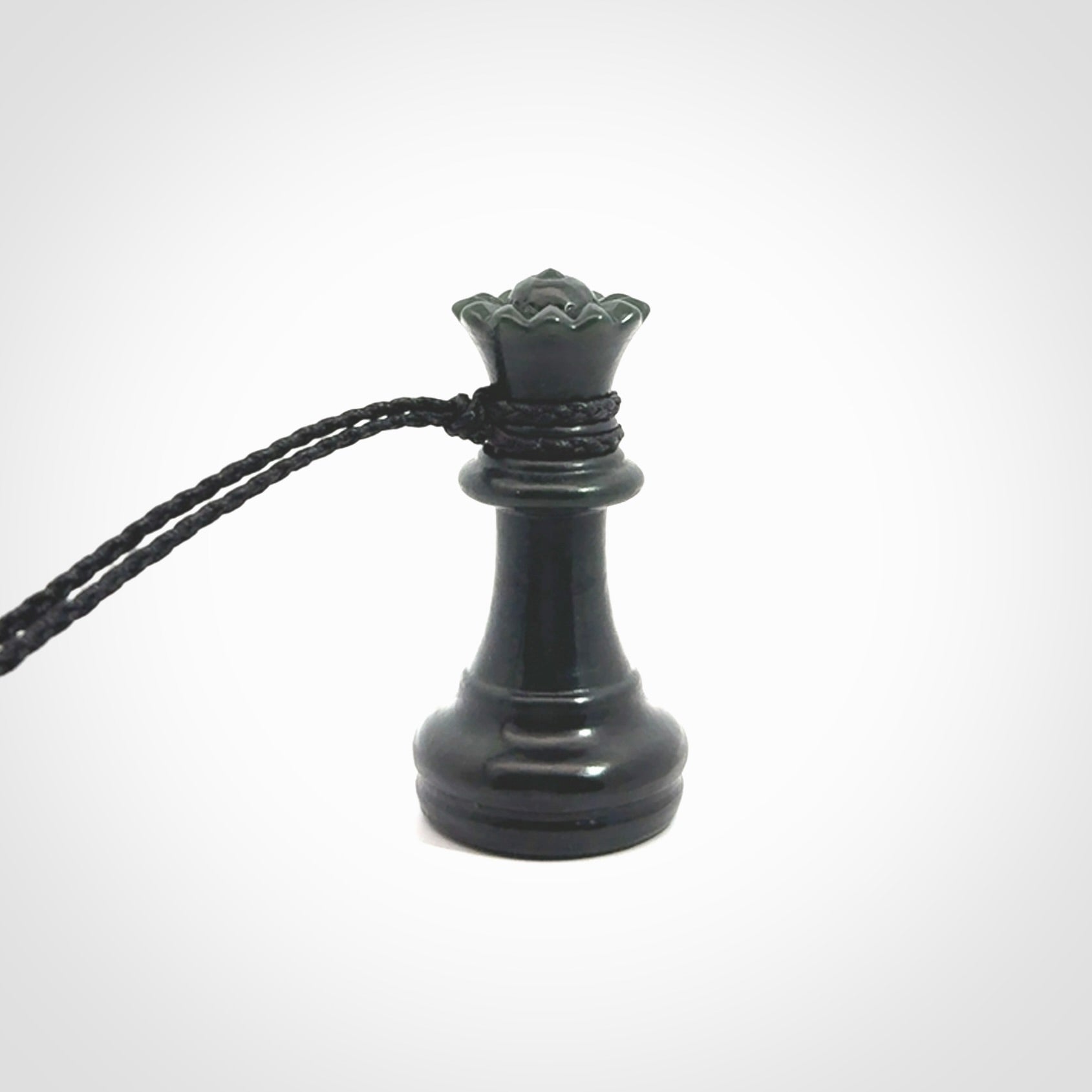 Hand carved jade chess pendants. Hand made chess piece necklaces, carved from British Columbian Jade.