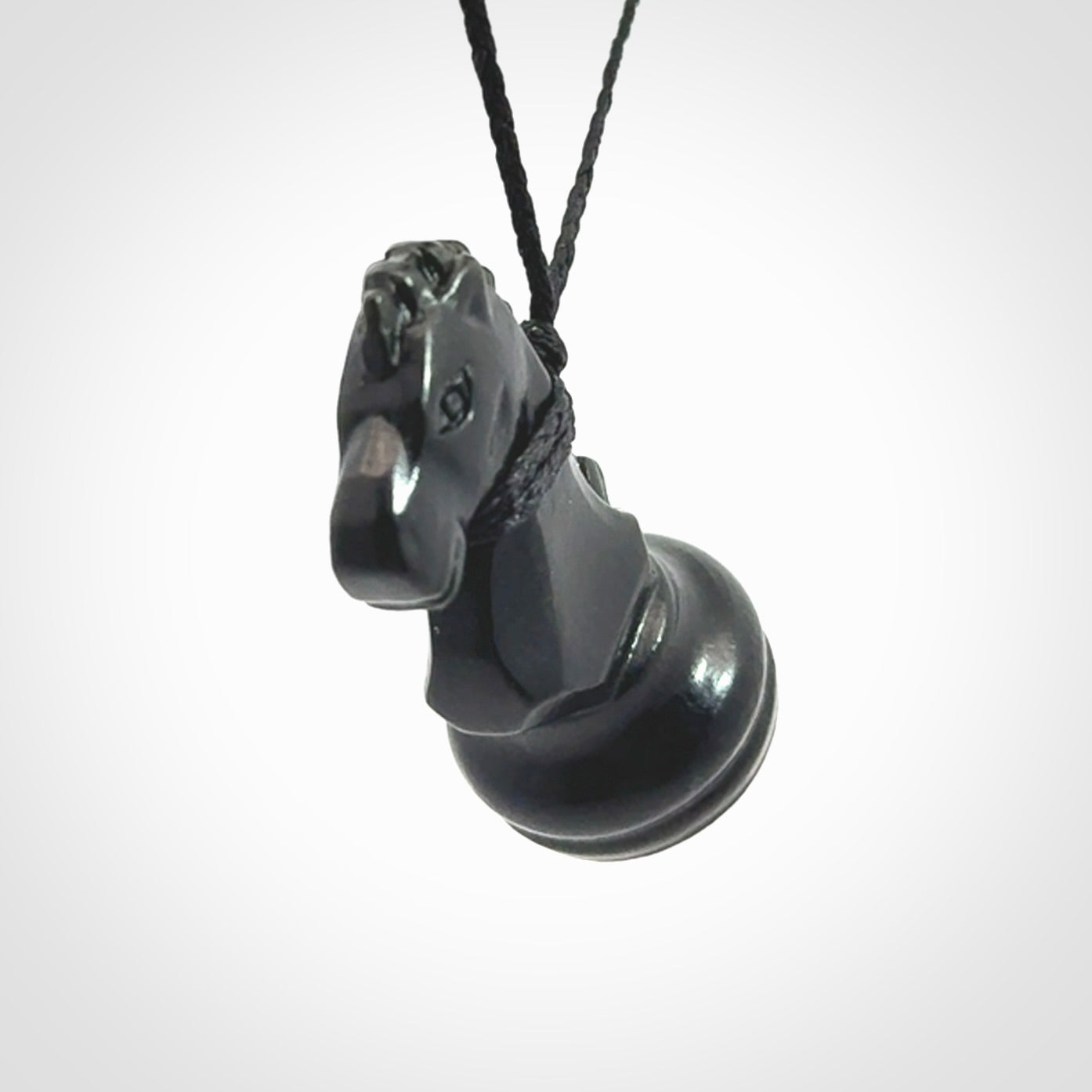 Hand carved jade chess pendants. Hand made chess piece necklaces, carved from British Columbian Jade.