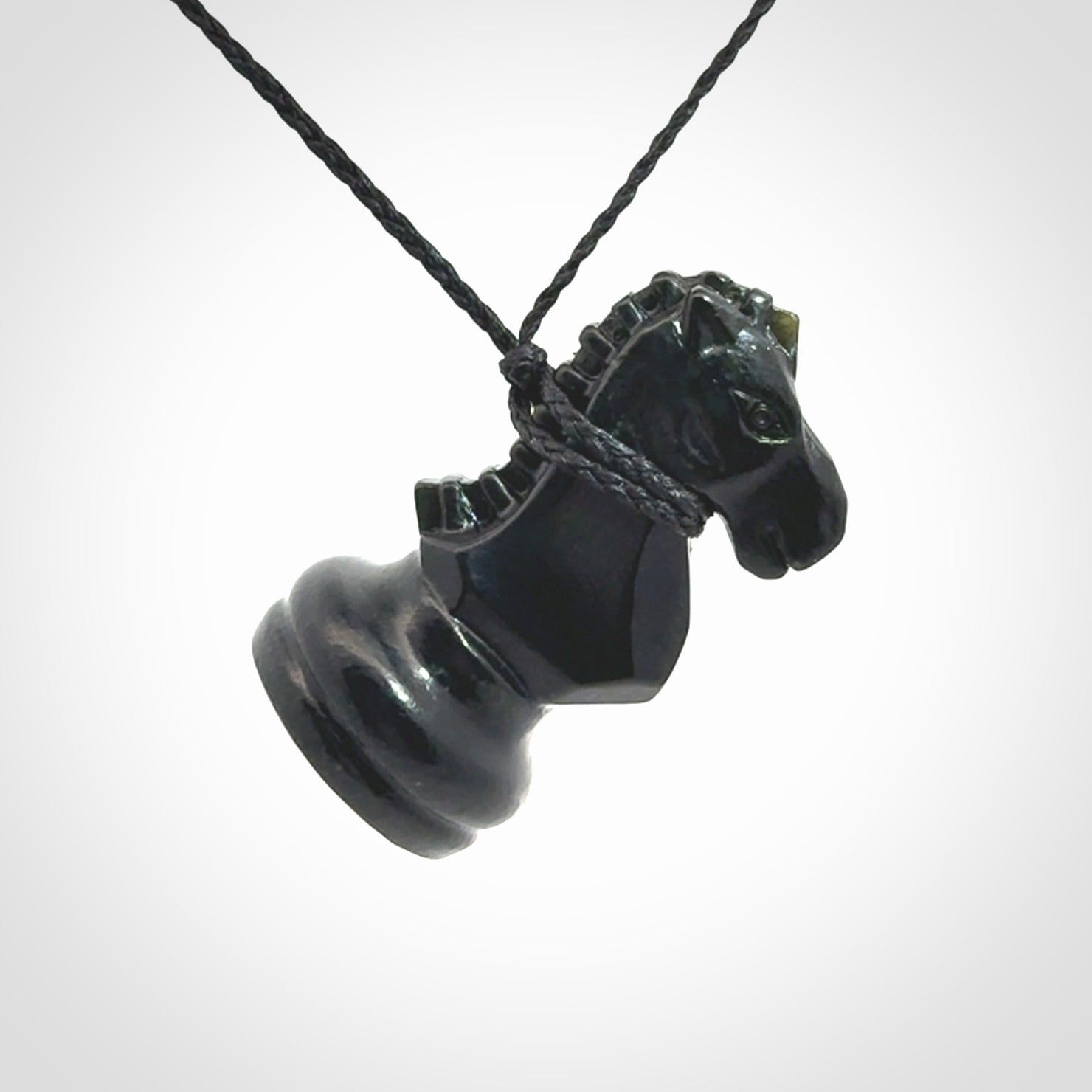 Hand carved jade chess pendants. Hand made chess piece necklaces, carved from British Columbian Jade.