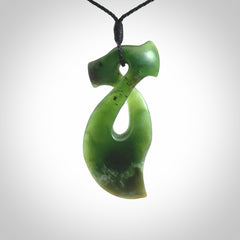 This hammerhead twist pendant is carved from a very striking New Zealand jade