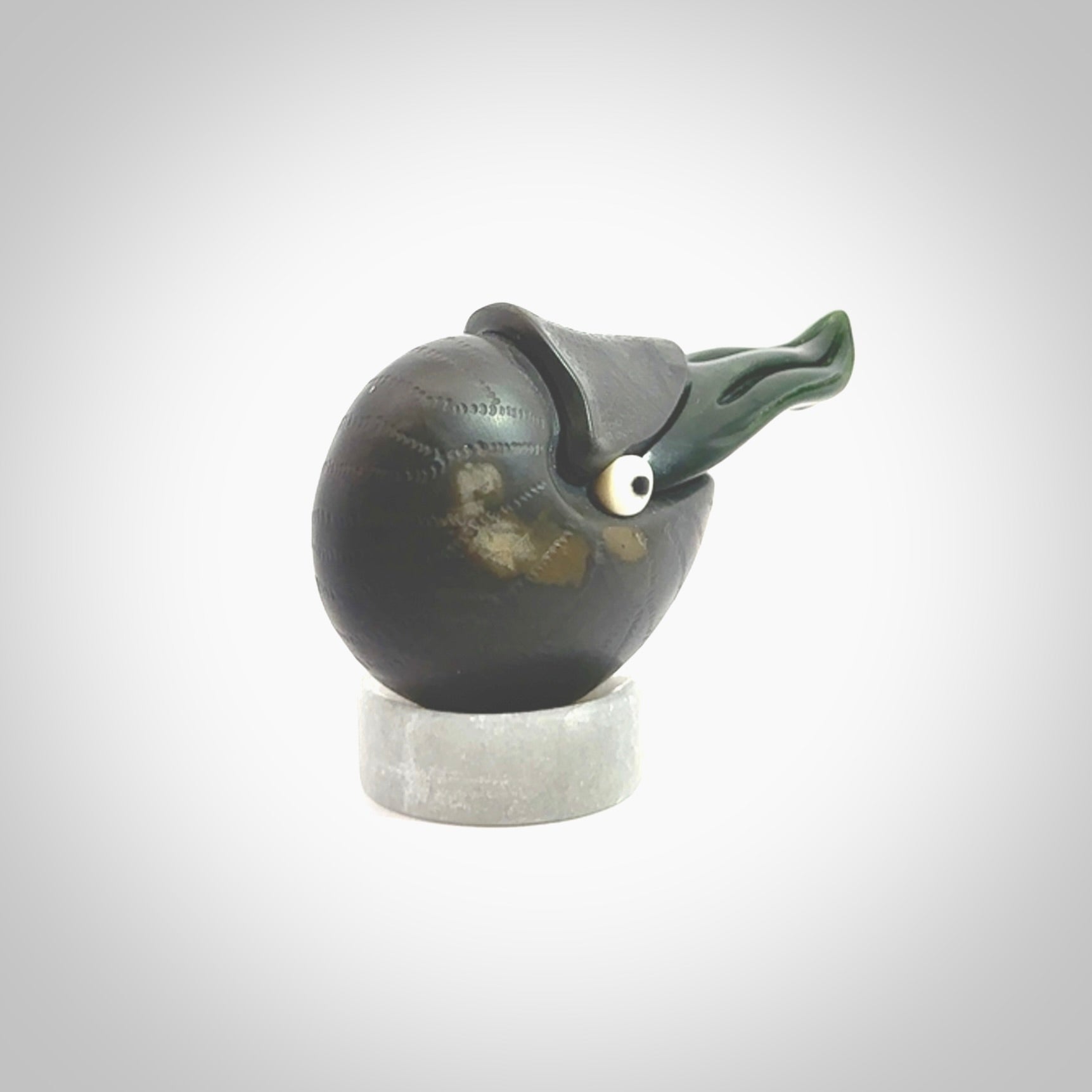 Hand carved New Zealand Jade Nautilus sculpture with Argillite, Bone and Buffalo Horn eyes and Marble stand. Hand made Jade Nautilus sculpture.