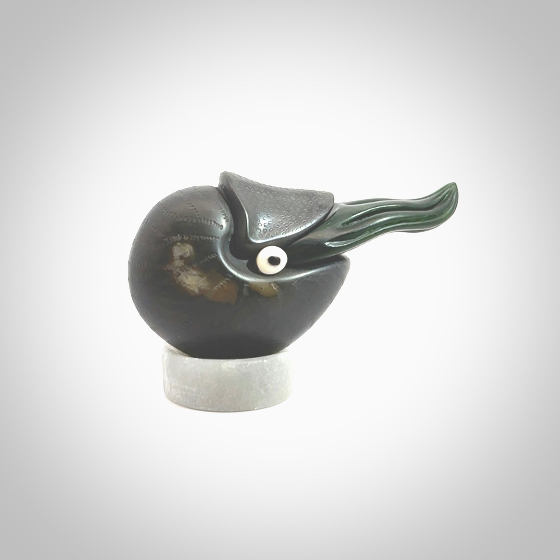 Hand carved New Zealand Jade Nautilus sculpture with Argillite, Bone and Buffalo Horn eyes and Marble stand. Hand made Jade Nautilus sculpture.