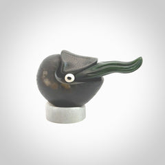 Hand carved New Zealand Jade Nautilus sculpture with Argillite, Bone and Buffalo Horn eyes and Marble stand. Hand made Jade Nautilus sculpture.