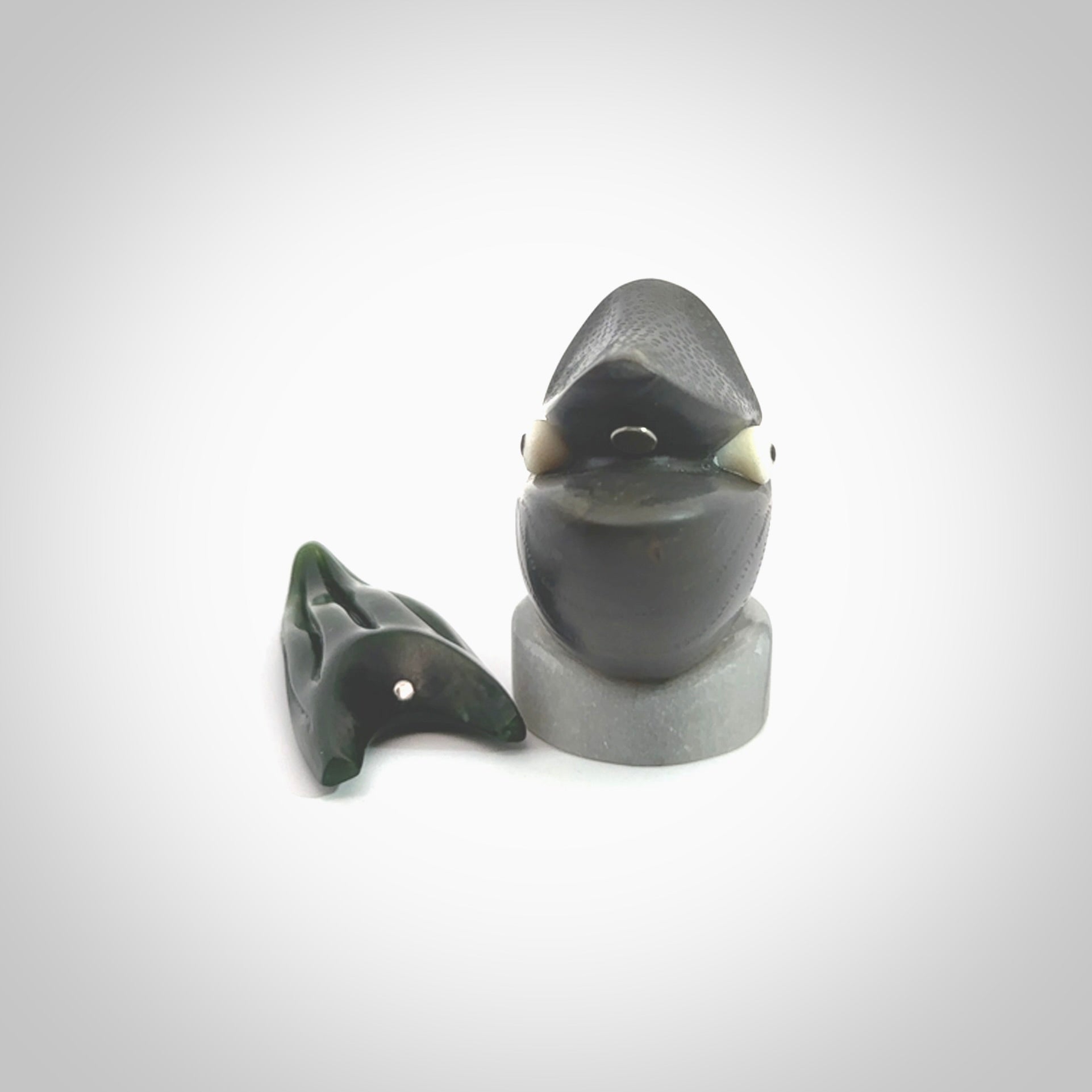 Hand carved New Zealand Jade Nautilus sculpture with Argillite, Bone and Buffalo Horn eyes and Marble stand. Hand made Jade Nautilus sculpture.