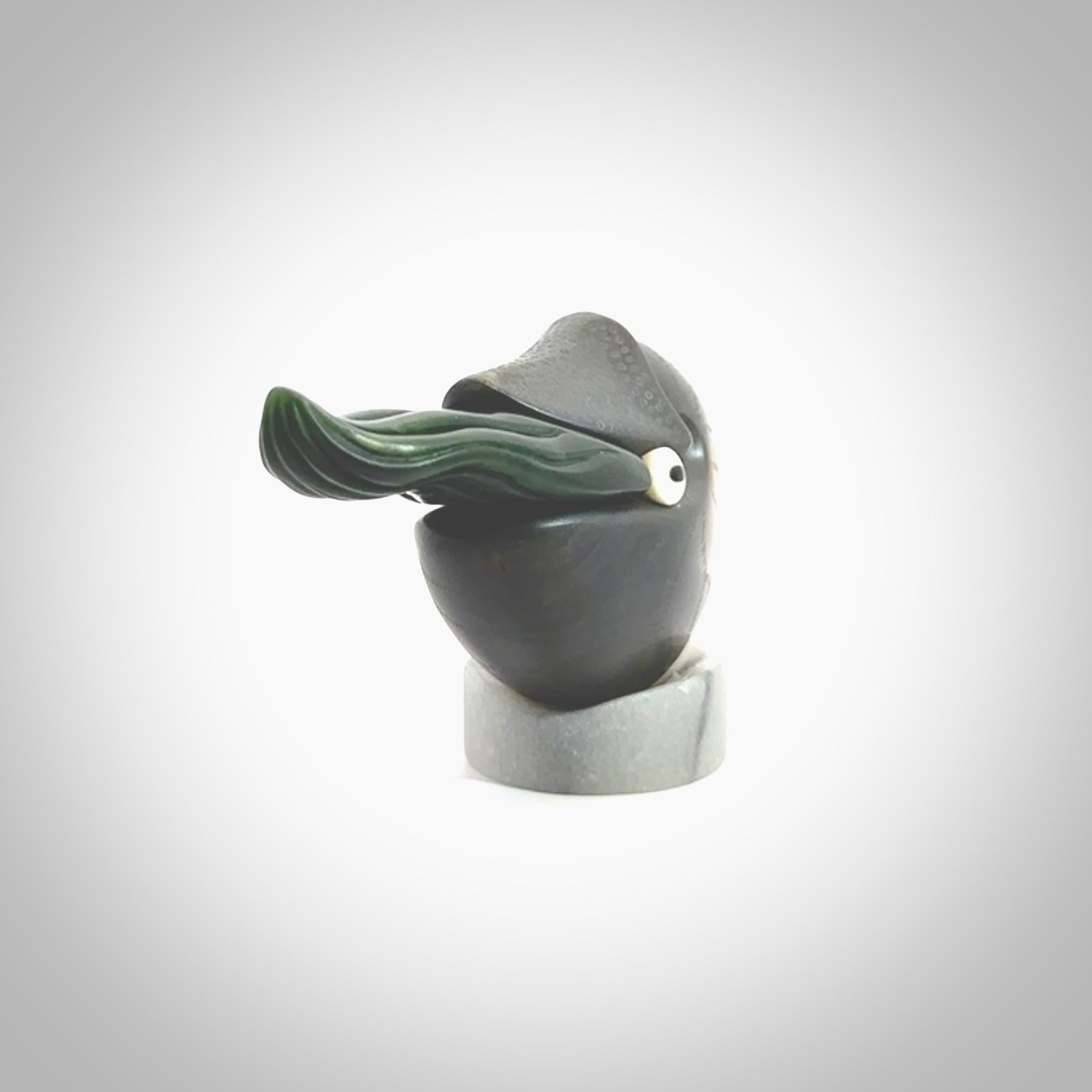 Hand carved New Zealand Jade Nautilus sculpture with Argillite, Bone and Buffalo Horn eyes and Marble stand. Hand made Jade Nautilus sculpture.