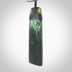 Hand carved from a lovely piece of local New Zealand Marsden Jade. The quality of the workmanship and design is outstanding - this is a piece you will want to wear all the time. We have suspended this from a 4-plait black cord which can be adjusted with a couple of slip knots and black binding. Hand made by Kyohei Noguchi.