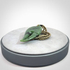This large crab claw pendant is carved from a lovely deep green piece of New Zealand jade. It has an adjustable Khaki coloured cord which can be slipped over the head and adjusted to the length that you prefer. Hand carved in New Zealand from our local jade by Kyohei Noguchi.