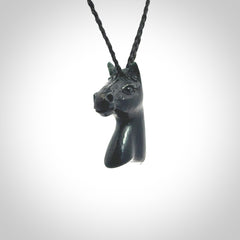 This medium sized horse pendant is made from New Zealand Jade. We've hand carved this piece for all the horse lovers out there. Free postage worldwide. Jade Stone horse head jewellery.