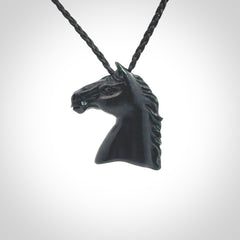 This medium sized horse pendant is made from New Zealand Jade. We've hand carved this piece for all the horse lovers out there. Free postage worldwide. Jade Stone horse head jewellery.
