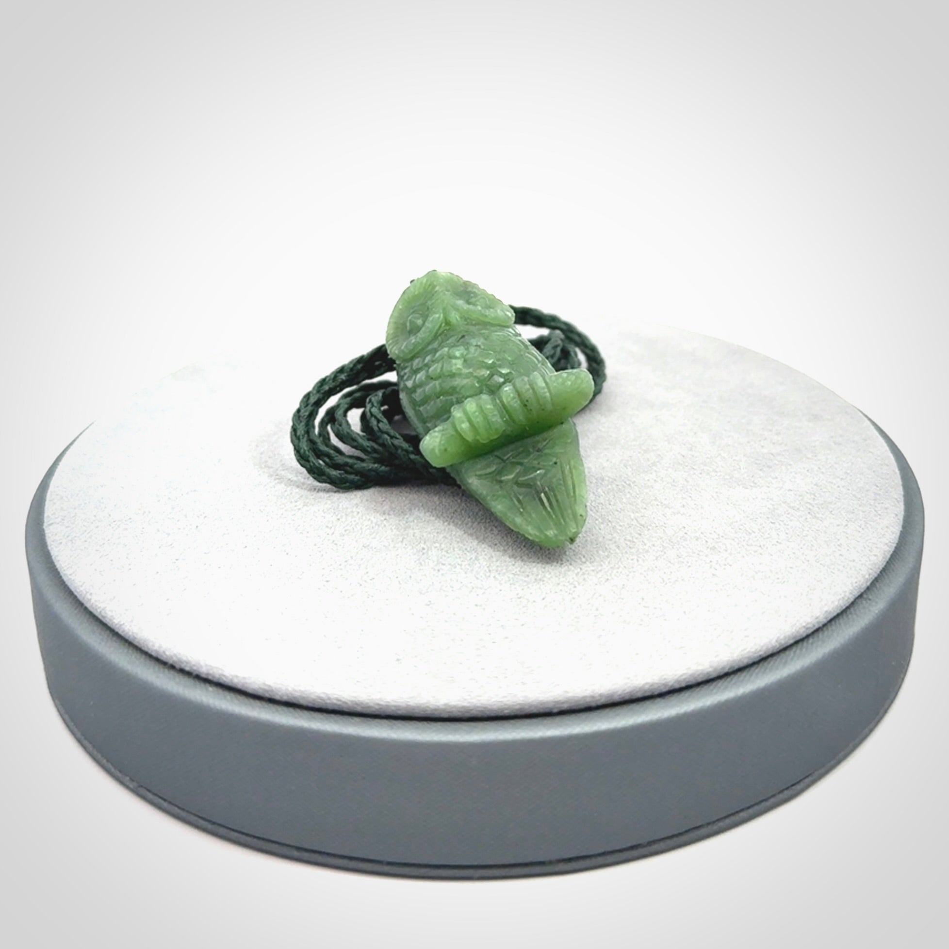 Hand carved Owl pendants, hand made for us from British Columbian Jade.