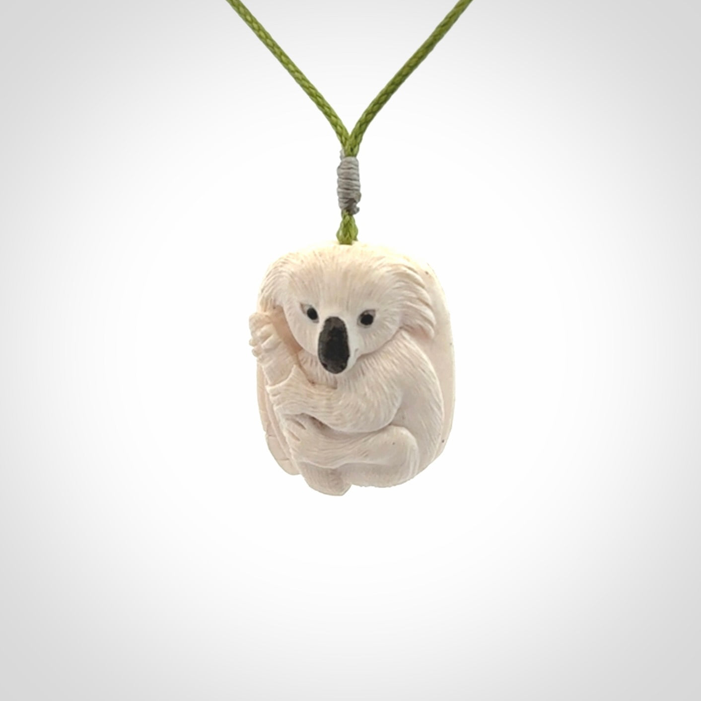 Hand carved woolly mammoth tusk koala bear pendant