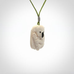 Hand carved woolly mammoth tusk koala bear pendant