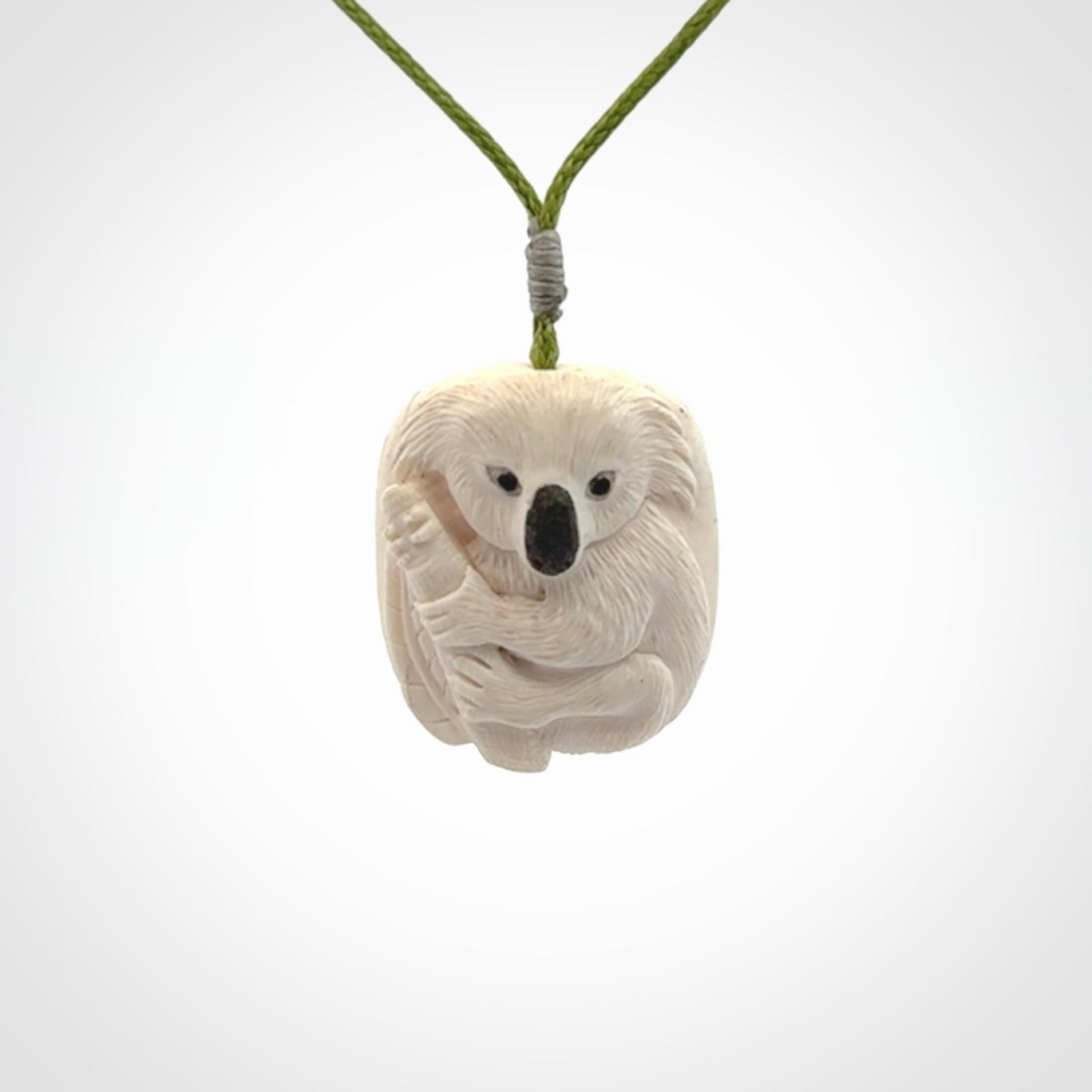 Hand carved woolly mammoth tusk koala bear pendant