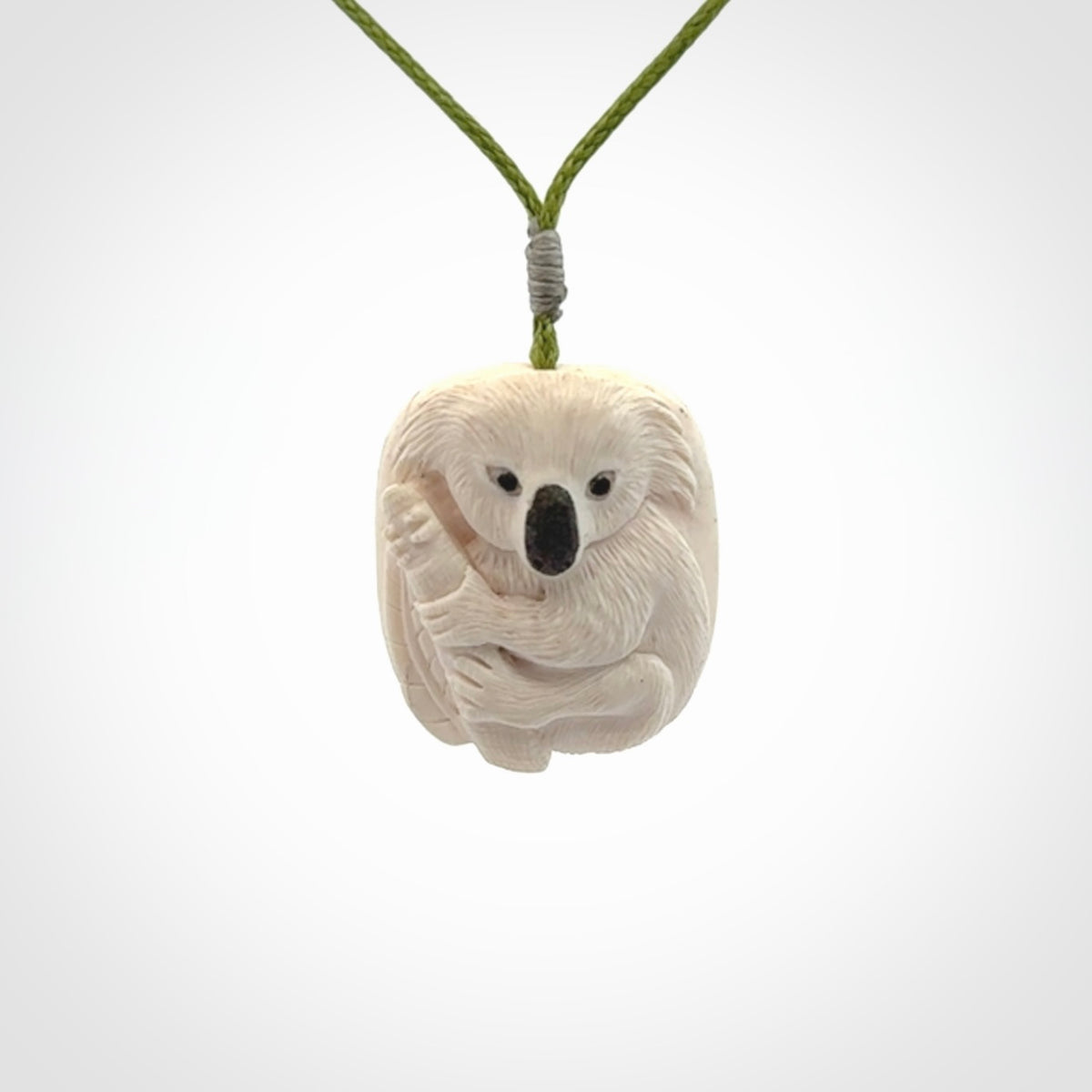 Hand carved woolly mammoth tusk koala bear pendant