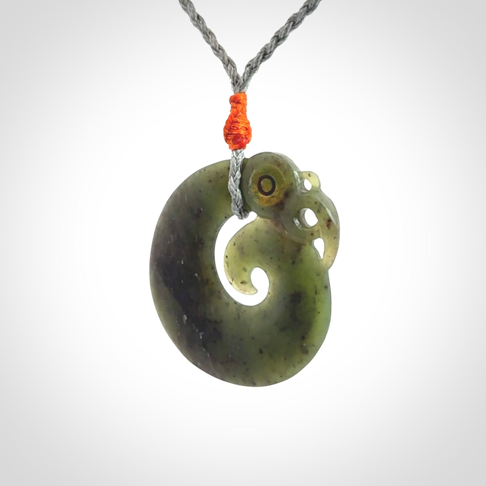 New Zealand Koru Manaia. Hand carved Koropepe pendant. Made in New Zealand. Real Jade, pounamu.