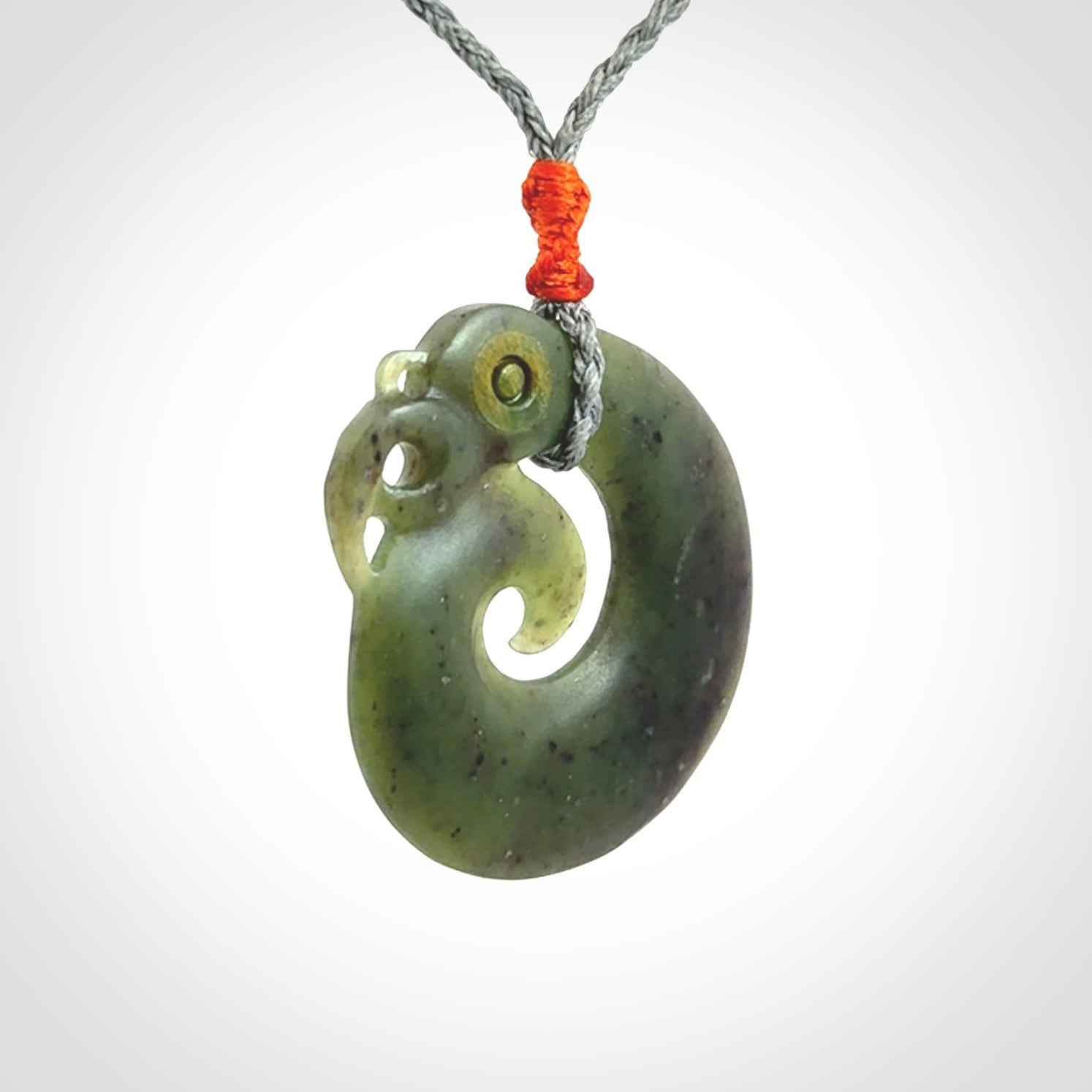 New Zealand Koru Manaia. Hand carved Koropepe pendant. Made in New Zealand. Real Jade, pounamu.