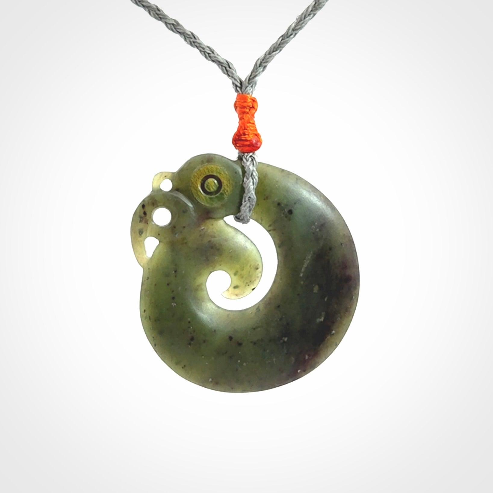 New Zealand Koru Manaia. Hand carved Koropepe pendant. Made in New Zealand. Real Jade, pounamu.