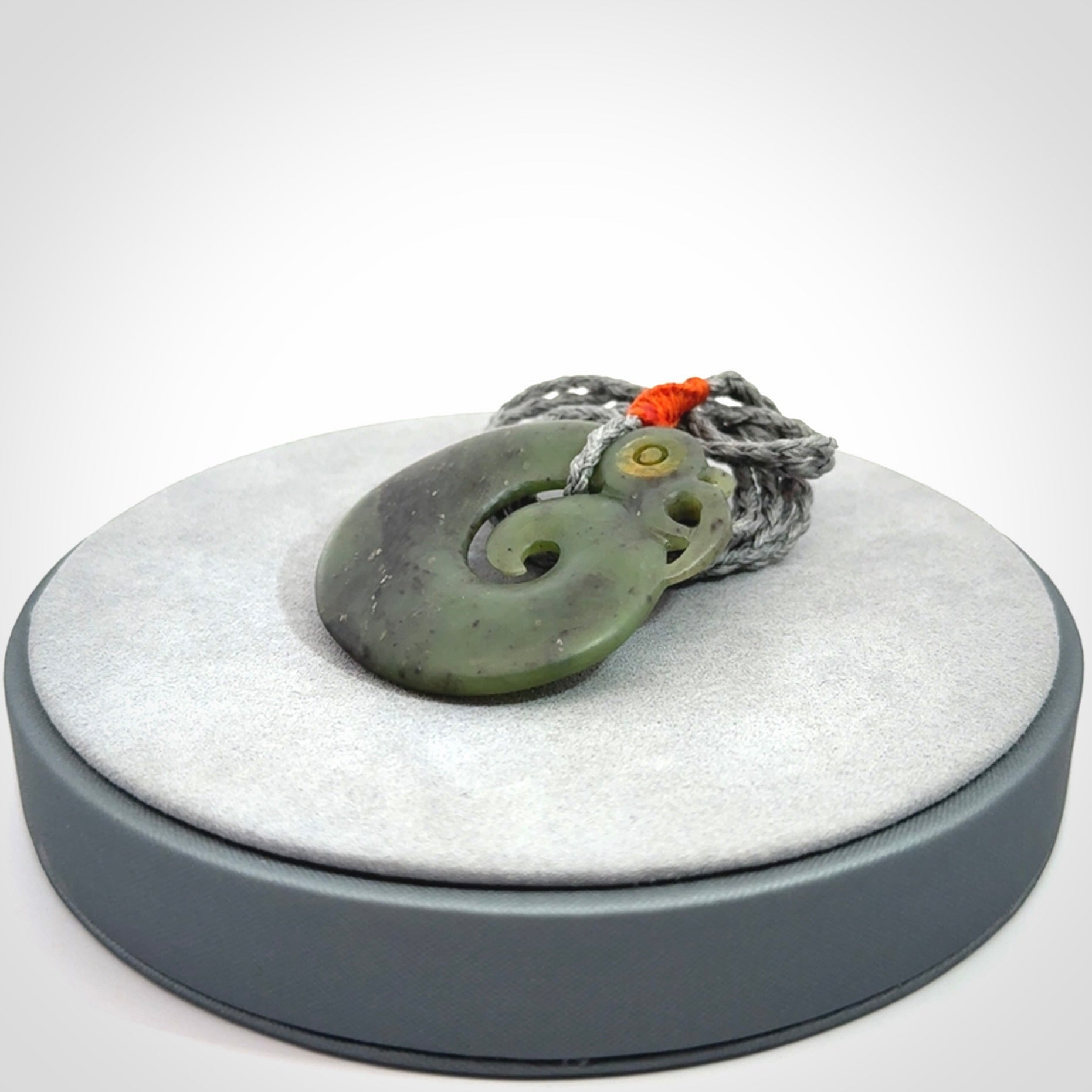 New Zealand Koru Manaia. Hand carved Koropepe pendant. Made in New Zealand. Real Jade, pounamu.