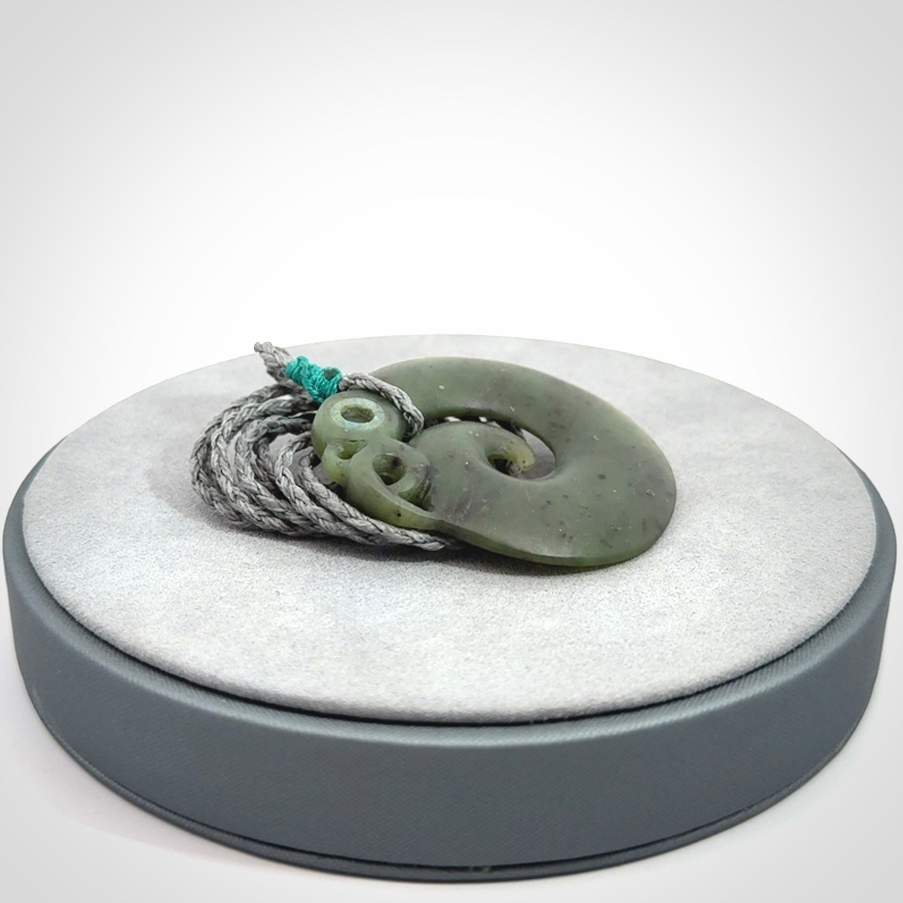 New Zealand Koru Manaia. Hand carved Koropepe pendant. Made in New Zealand. Real Jade, pounamu.