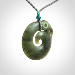 New Zealand Koru Manaia. Hand carved Koropepe pendant. Made in New Zealand. Real Jade, pounamu.