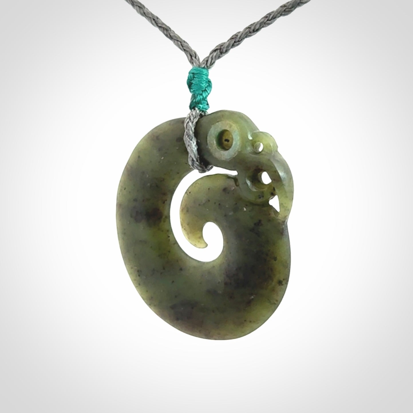New Zealand Koru Manaia. Hand carved Koropepe pendant. Made in New Zealand. Real Jade, pounamu.