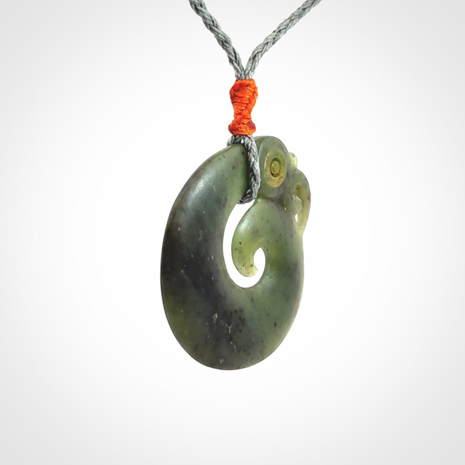 New Zealand Koru Manaia. Hand carved Koropepe pendant. Made in New Zealand. Real Jade, pounamu.