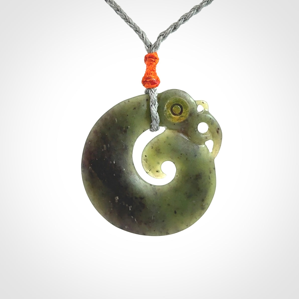 New Zealand Koru Manaia. Hand carved Koropepe pendant. Made in New Zealand. Real Jade, pounamu.