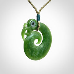 New Zealand Koru Manaia. Hand carved koropepe pendant. Made in New Zealand. Real Jade, pounamu.