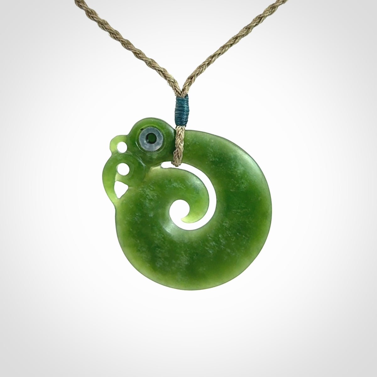 New Zealand Koru Manaia. Hand carved koropepe pendant. Made in New Zealand. Real Jade, pounamu.