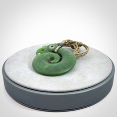 New Zealand Koru Manaia. Hand carved koropepe pendant. Made in New Zealand. Real Jade, pounamu.