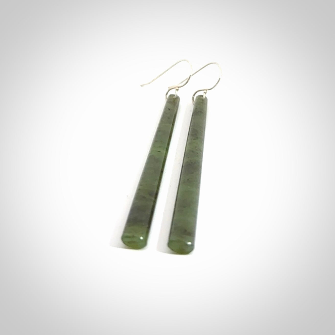 Hand crafted large, New Zealand Jade drop earrings with Sterling Silver Hooks. Jade drop earrings, packaged in a woven kete pouch.