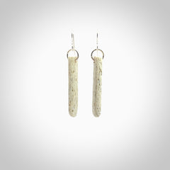 Hand carved medium whalebone drop earrings hand made by Kristal Thompson. One only whale bone drop earrings. Real whale bone art to wear. Free Shipping worldwide. One pair only, delivered in a kete pouch.