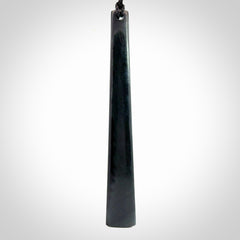 A hand carved large Black Jade drop, roimata, necklace. The cord is a black colour and is a fixed length. A large sized hand made drop necklace by New Zealand artist Kerry Thompson. One off work of art to wear.