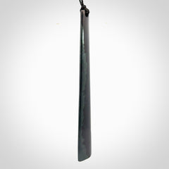 A hand carved large Black Jade drop, roimata, necklace. The cord is a black colour and is a fixed length. A large sized hand made drop necklace by New Zealand artist Kerry Thompson. One off work of art to wear.