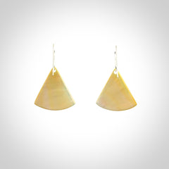 Hand carved New Zealand mother of pearl drop, Koru earrings hand made by Kerry and Amanda Thompson. One only large Koru earrings. Real New Zealand Mother of Pearl art to wear. Free Shipping worldwide.