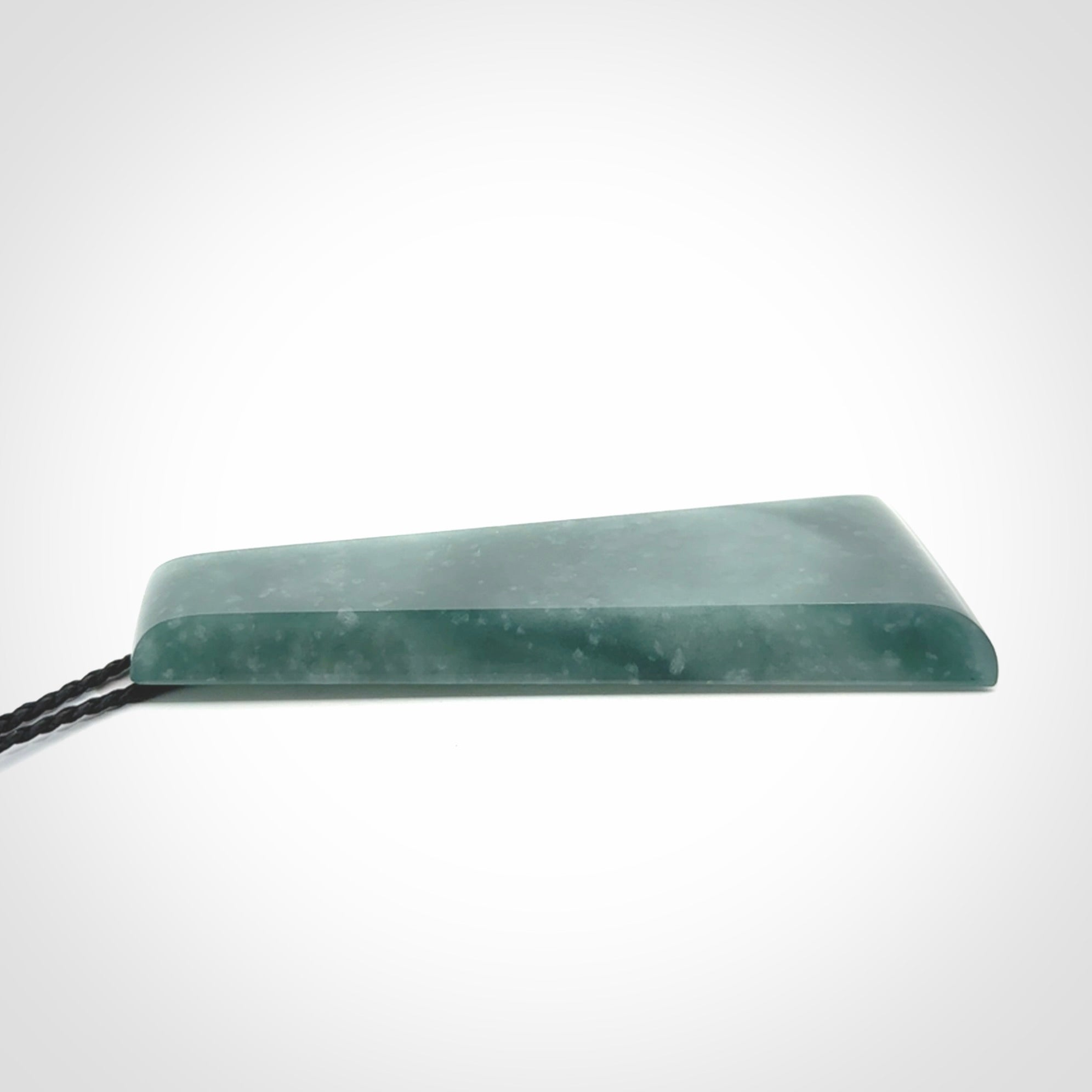 Hand carved large Guatemalan Jadeite Toki pendant.