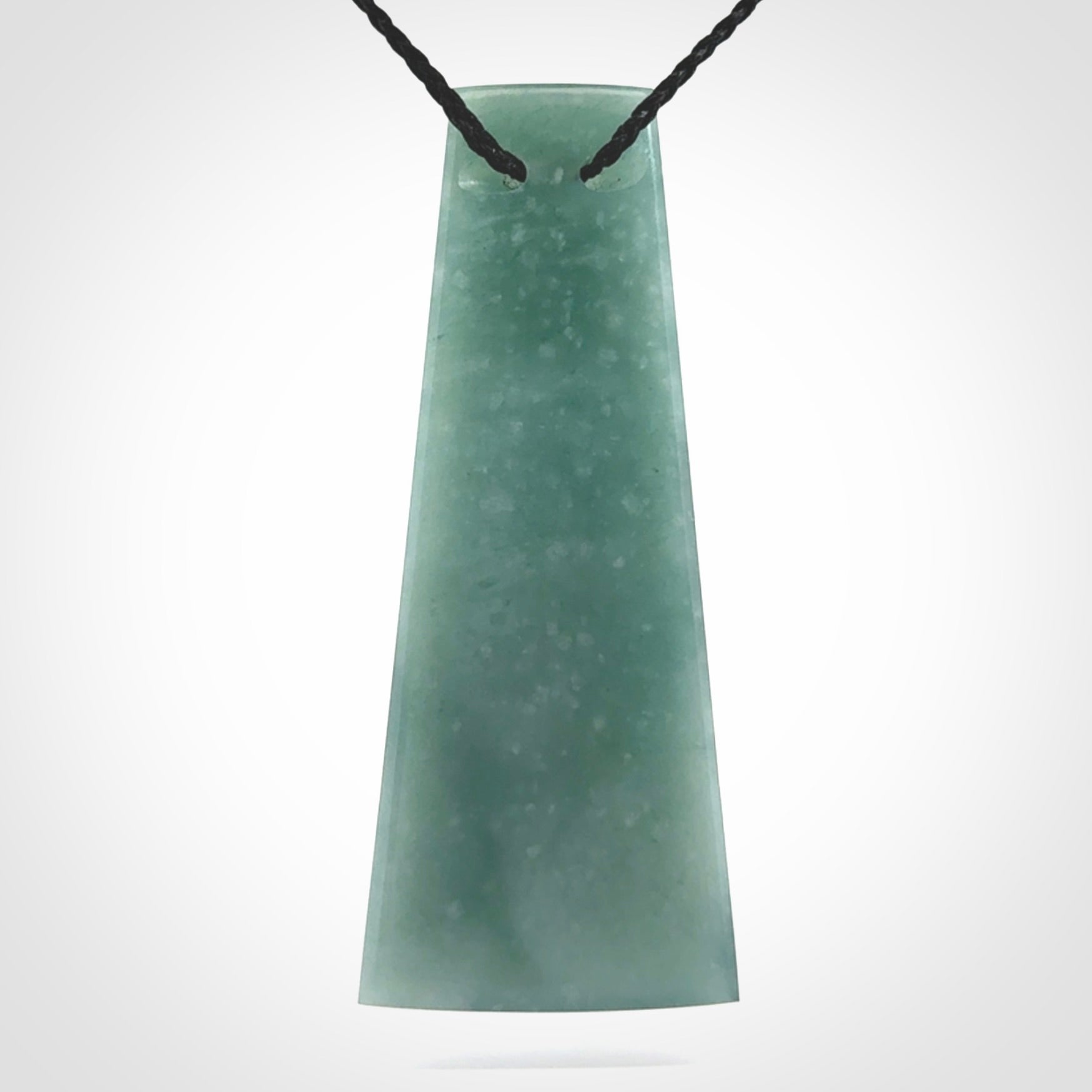 Hand carved large Guatemalan Jadeite Toki pendant.